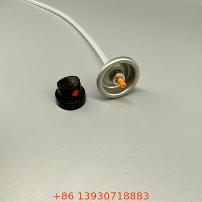 Zawór aerozolowy suchego szamponu przeznaczony do dozowania drobnych cząstek